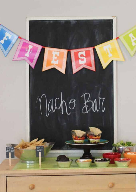 Cinco de mayo nacho bar with a chalkboard