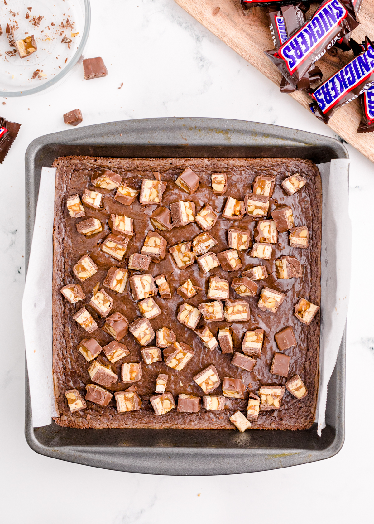 brownies with Snickers chopped on top of it