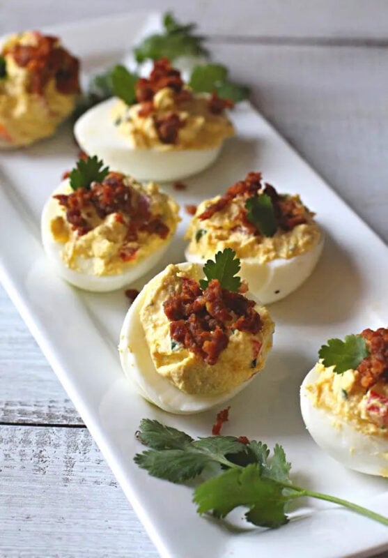 white plate with chorizo deviled eggs
