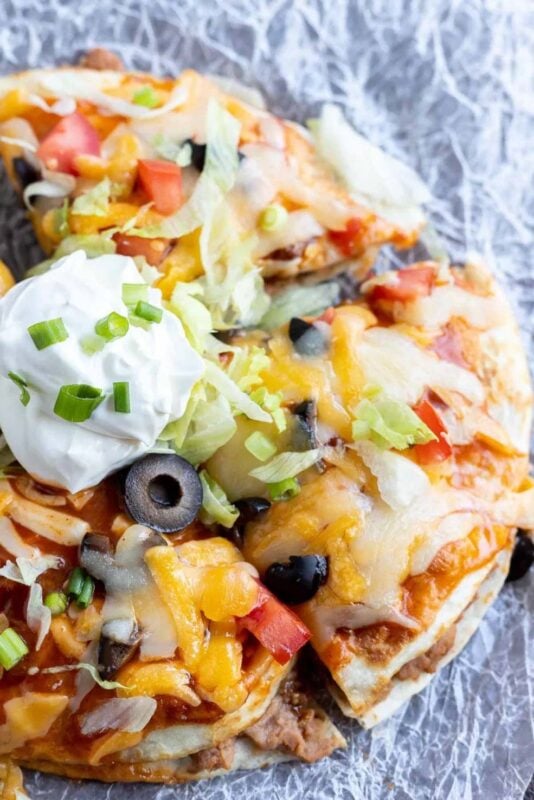 Mexican pizza on a white plate