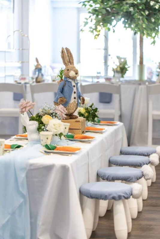 baby shower tablescape with Peter Rabbit on top