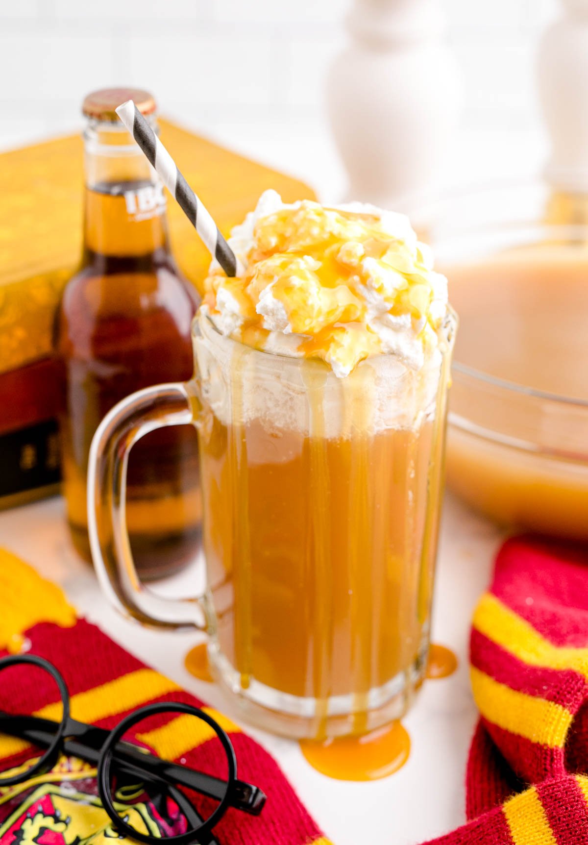 glass of butterbeer with a straw