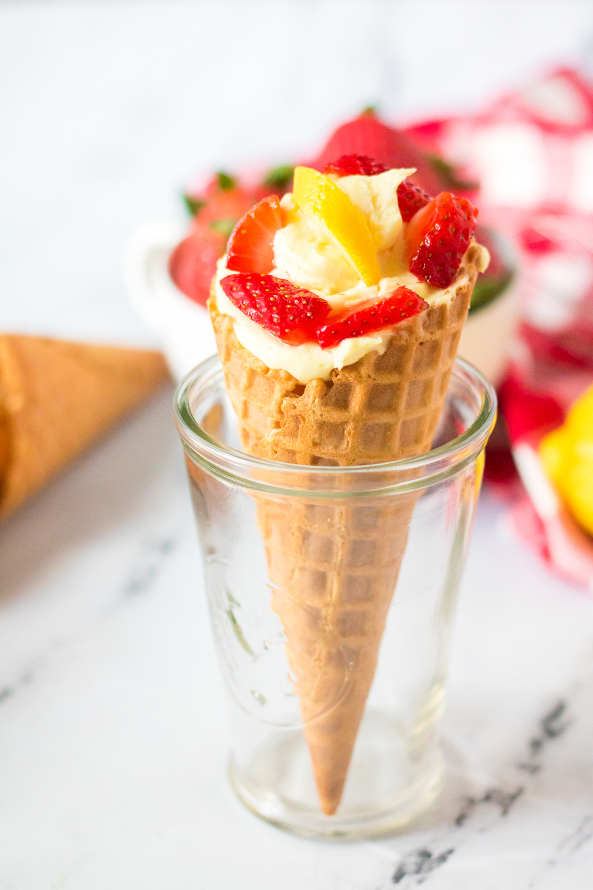 strawberry cheesecake cone in a glass
