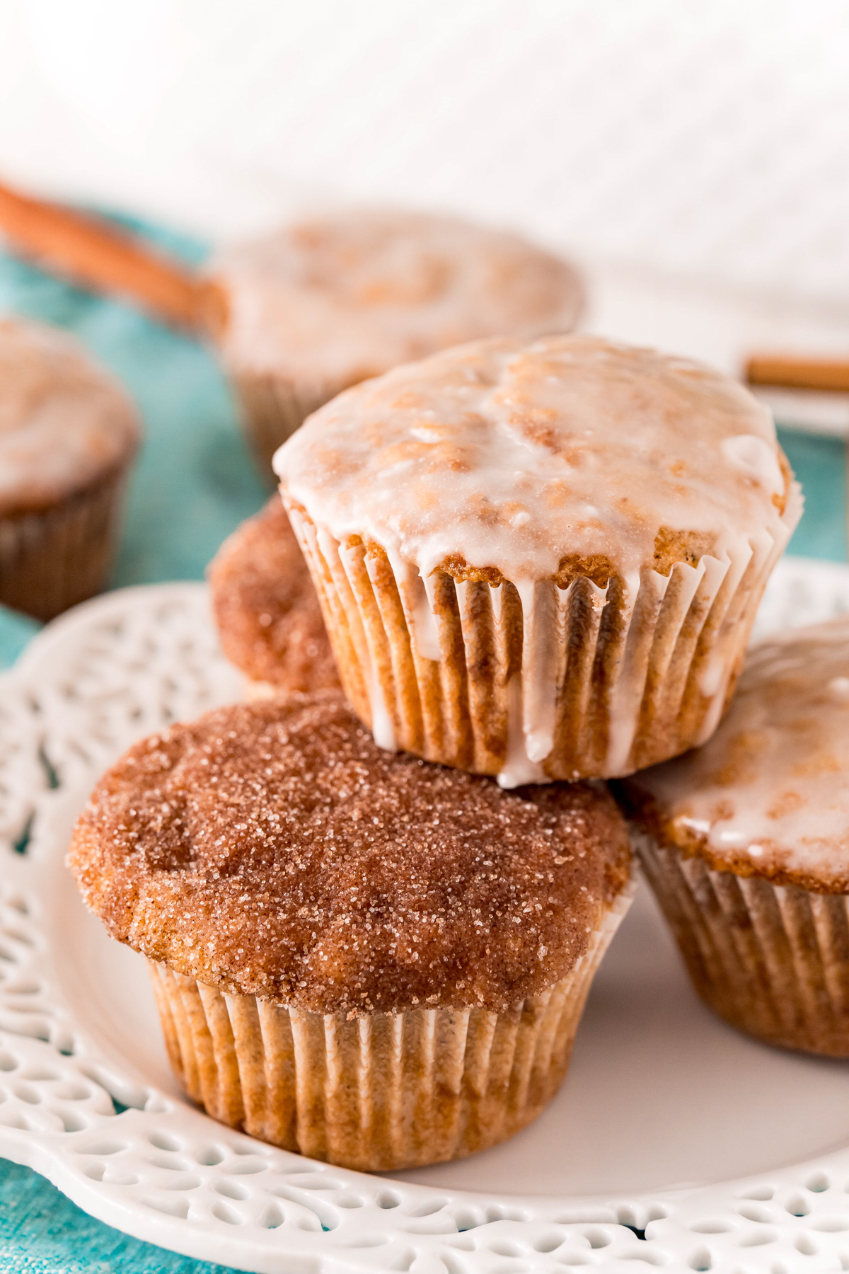 stack of cinnamon sugar donut muffins with glaze