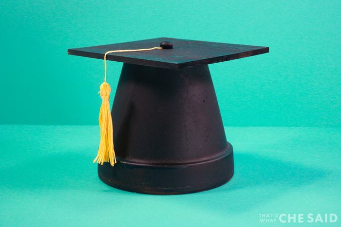 graduation cap made out of a clay pot