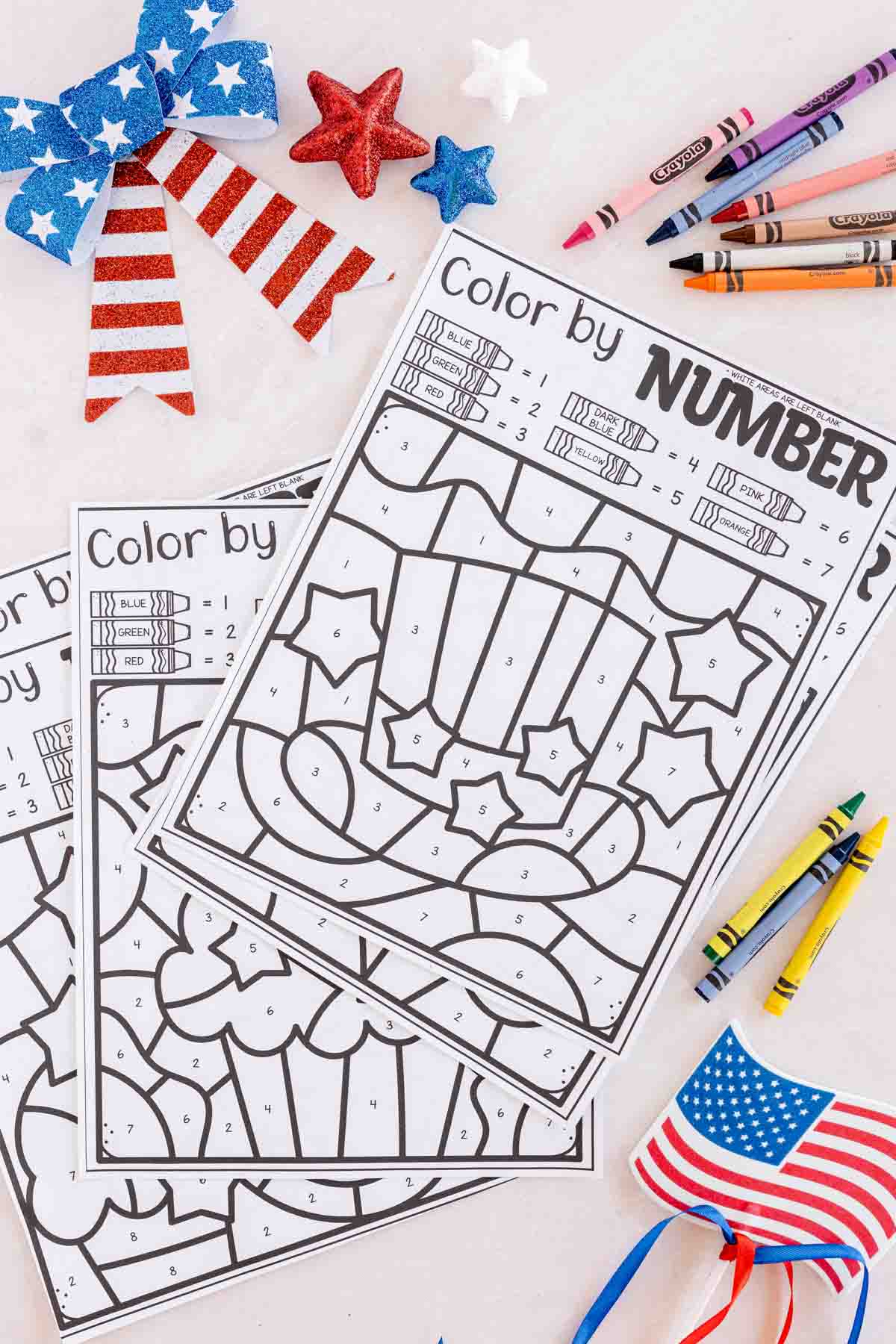 uncolored Memorial Day coloring pages in a stack