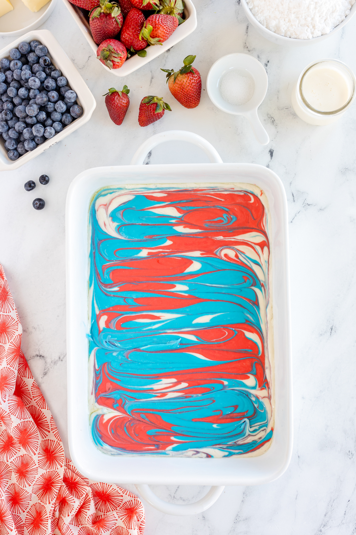 red white and blue swirled cake batter