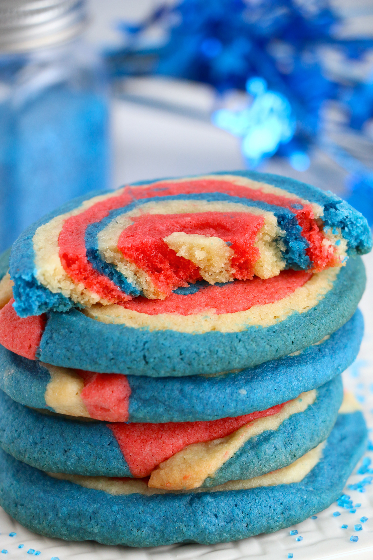red, white, and blue pinwheel cookie broken in half