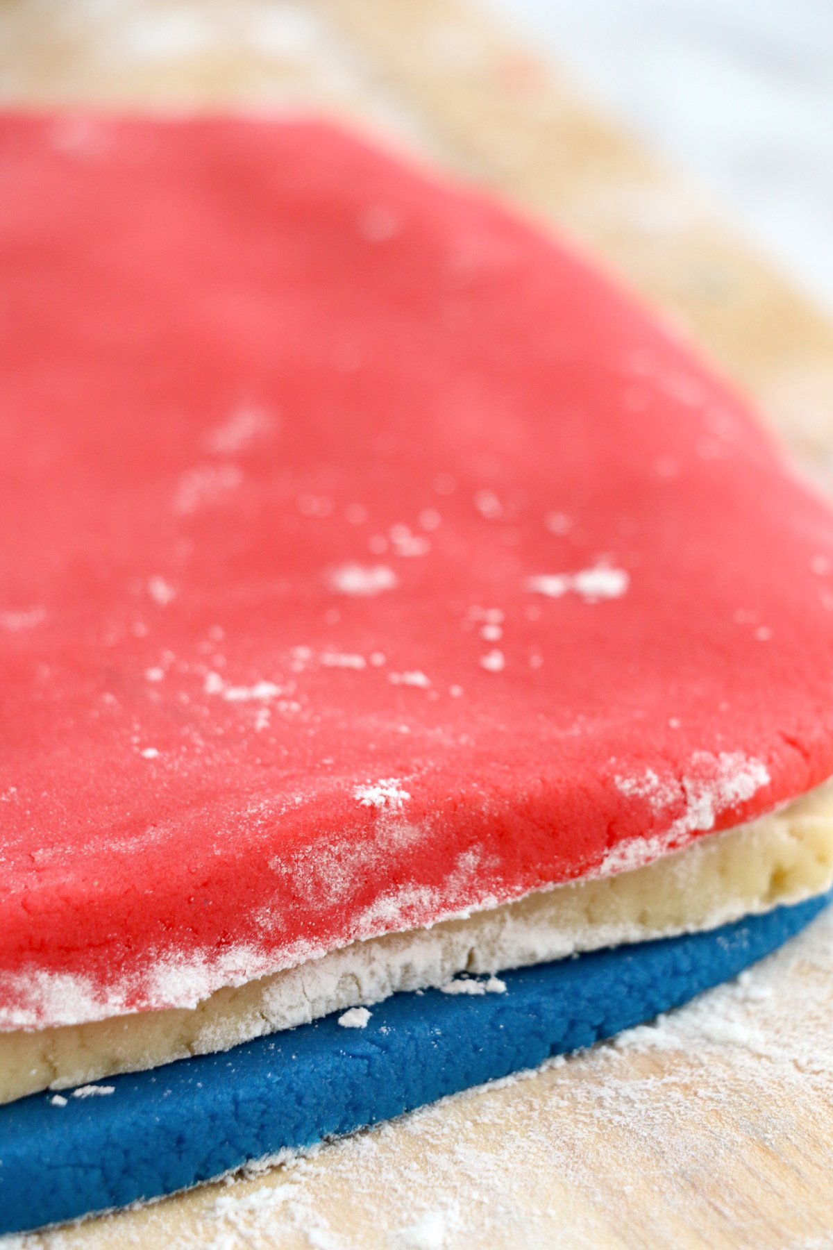 red white and blue sugar cookie dough stacked on top of each other