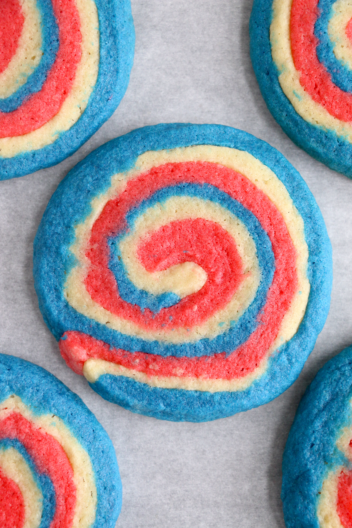 baked 4th of July pinwheel cookie on a baking sheet