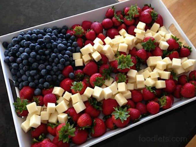 flag made out of berries and white cheese