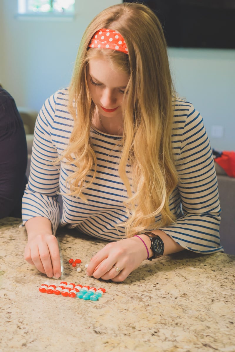 woman playing with patriotic jelly beans