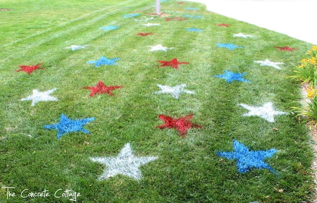 red white and blue stars painted on a lawn