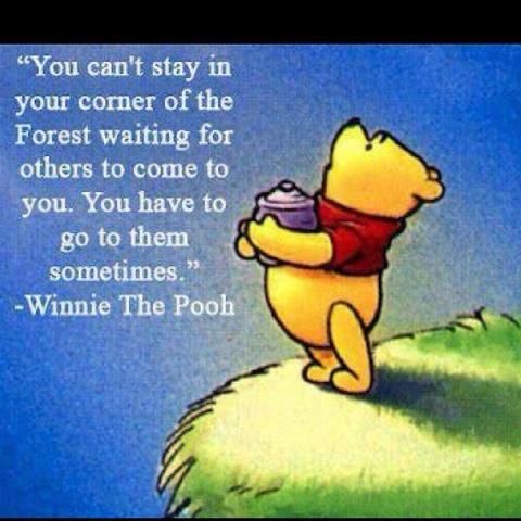 pooh standing next to a winnie the pooh quote