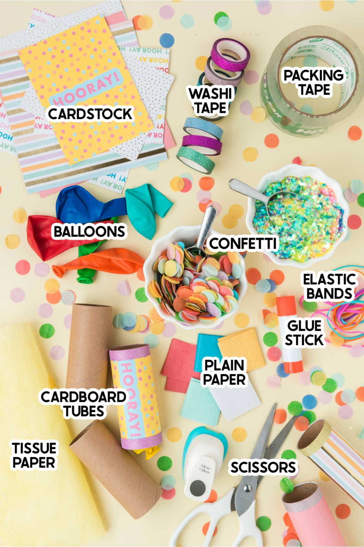 supplies to make DIY confetti poppers with labels