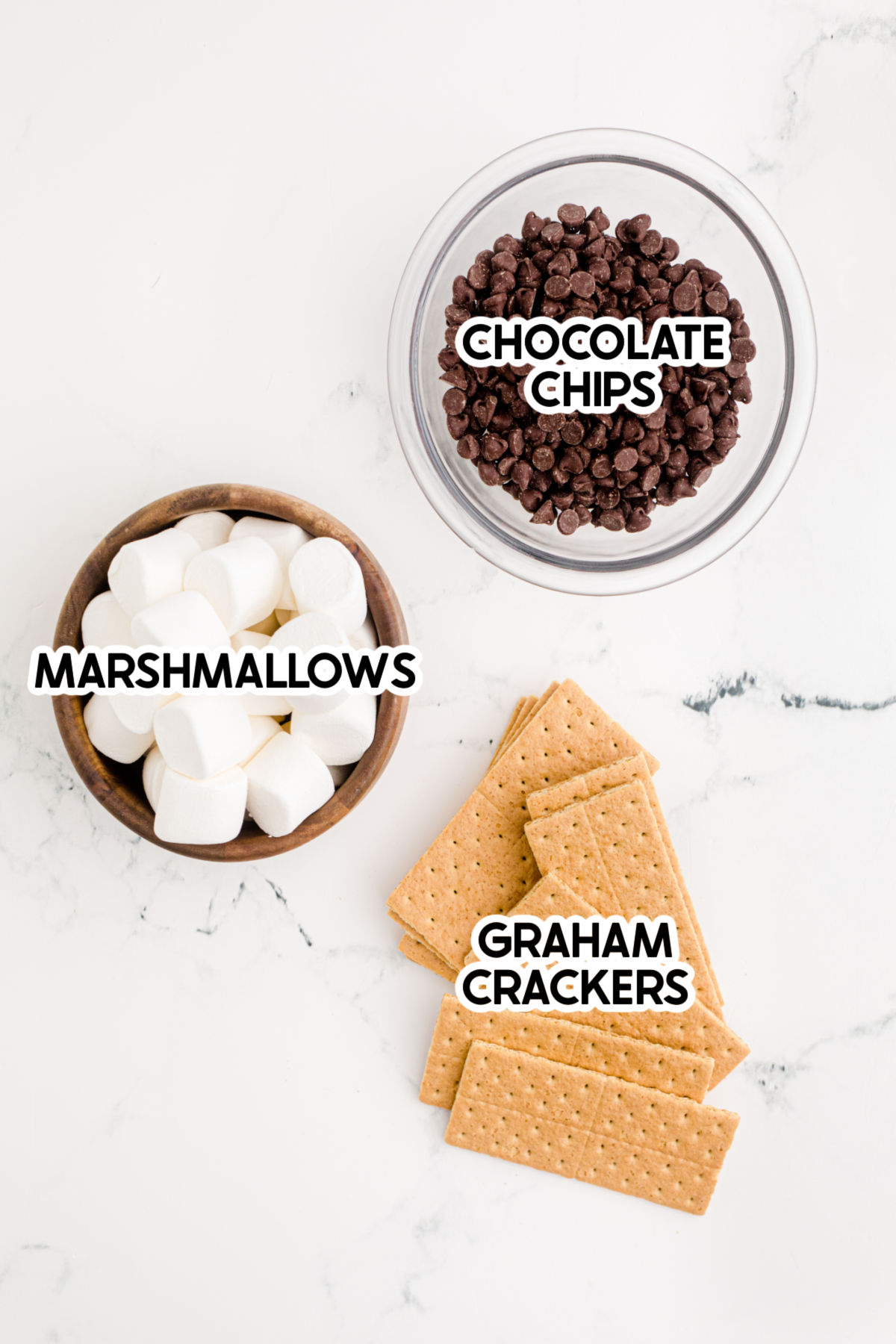 ingredients for a smores dip with labels