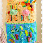 beach cake made with frosting and graham cracker sand
