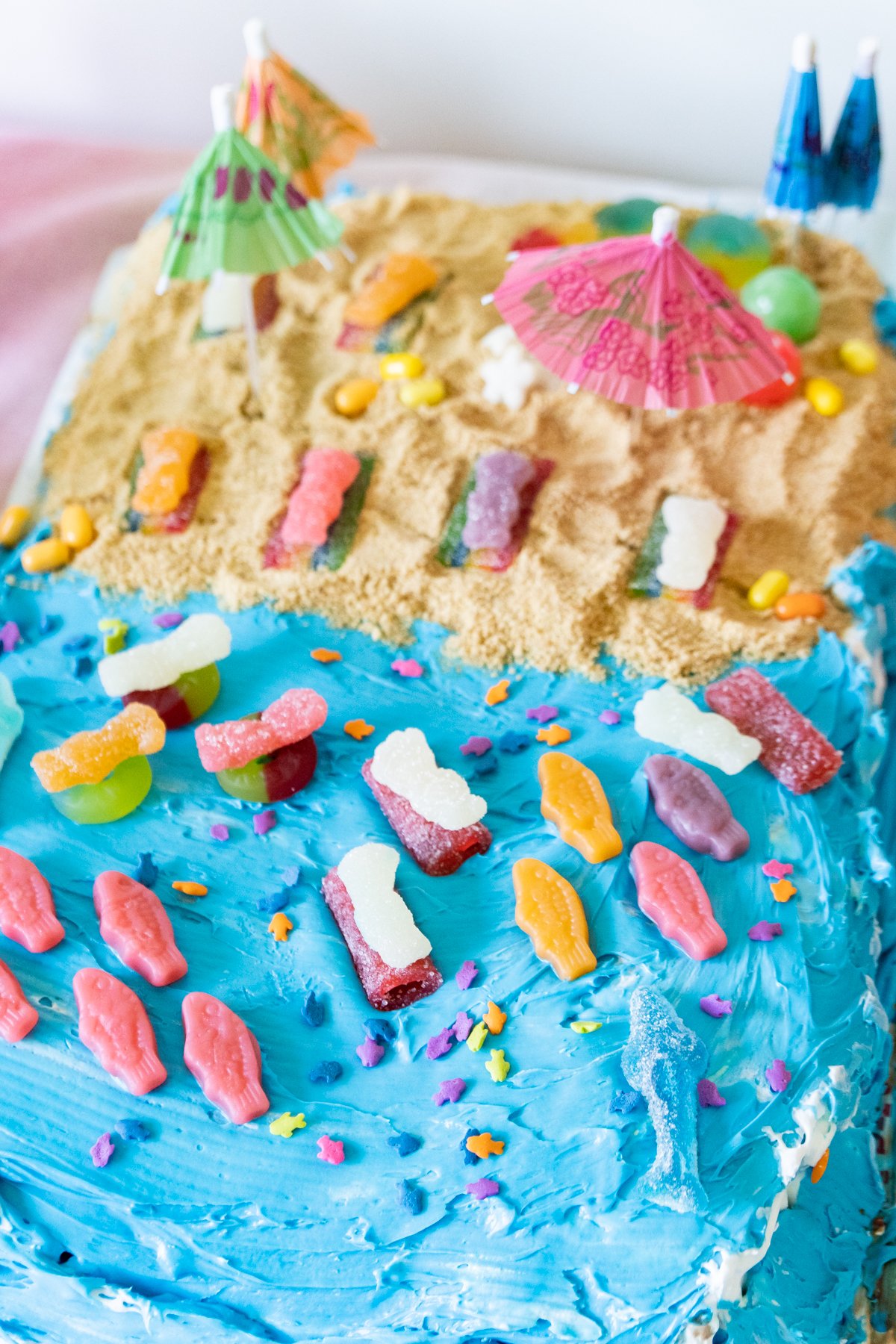 beach cake with people swimming