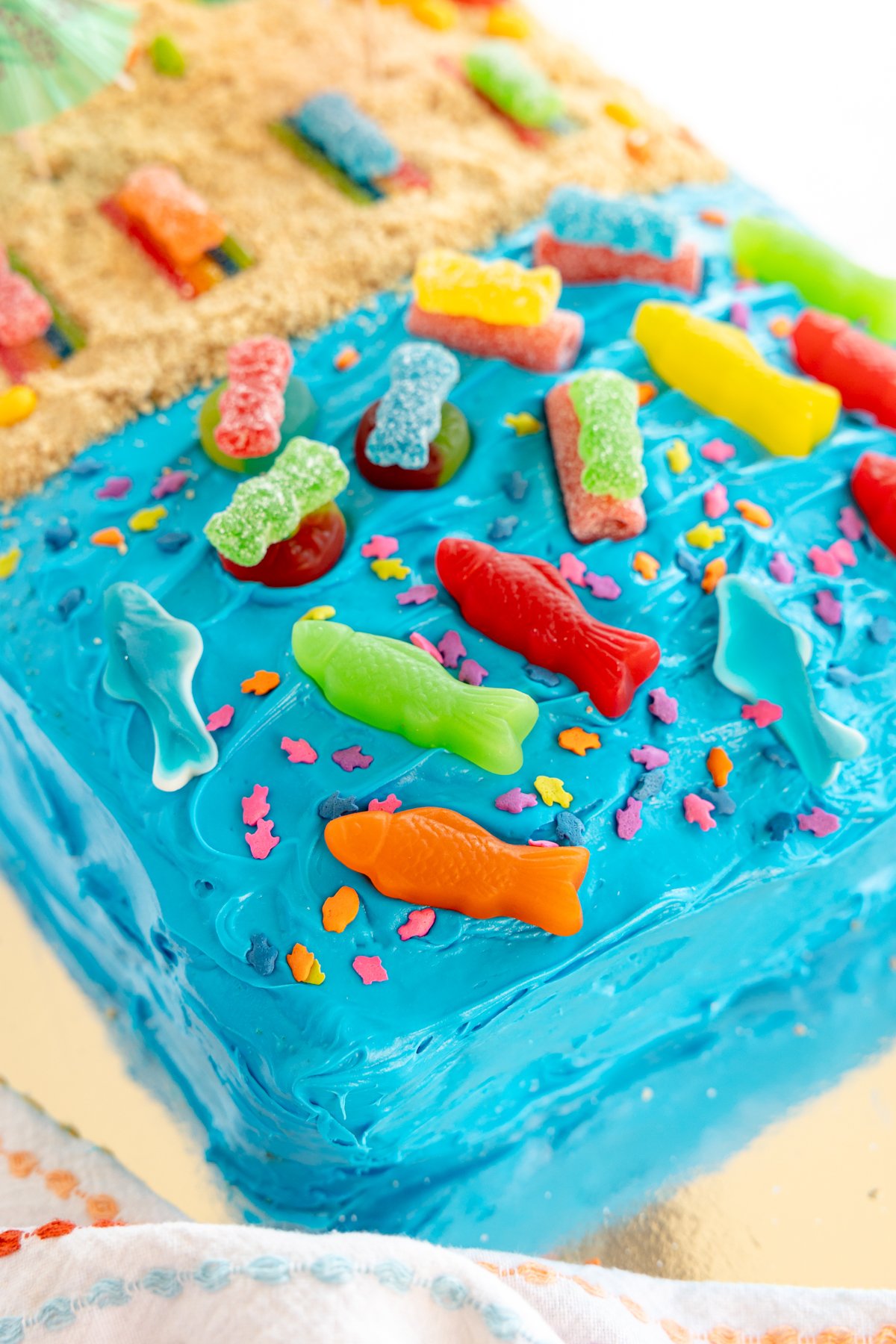 ocean area with a beach themed cake