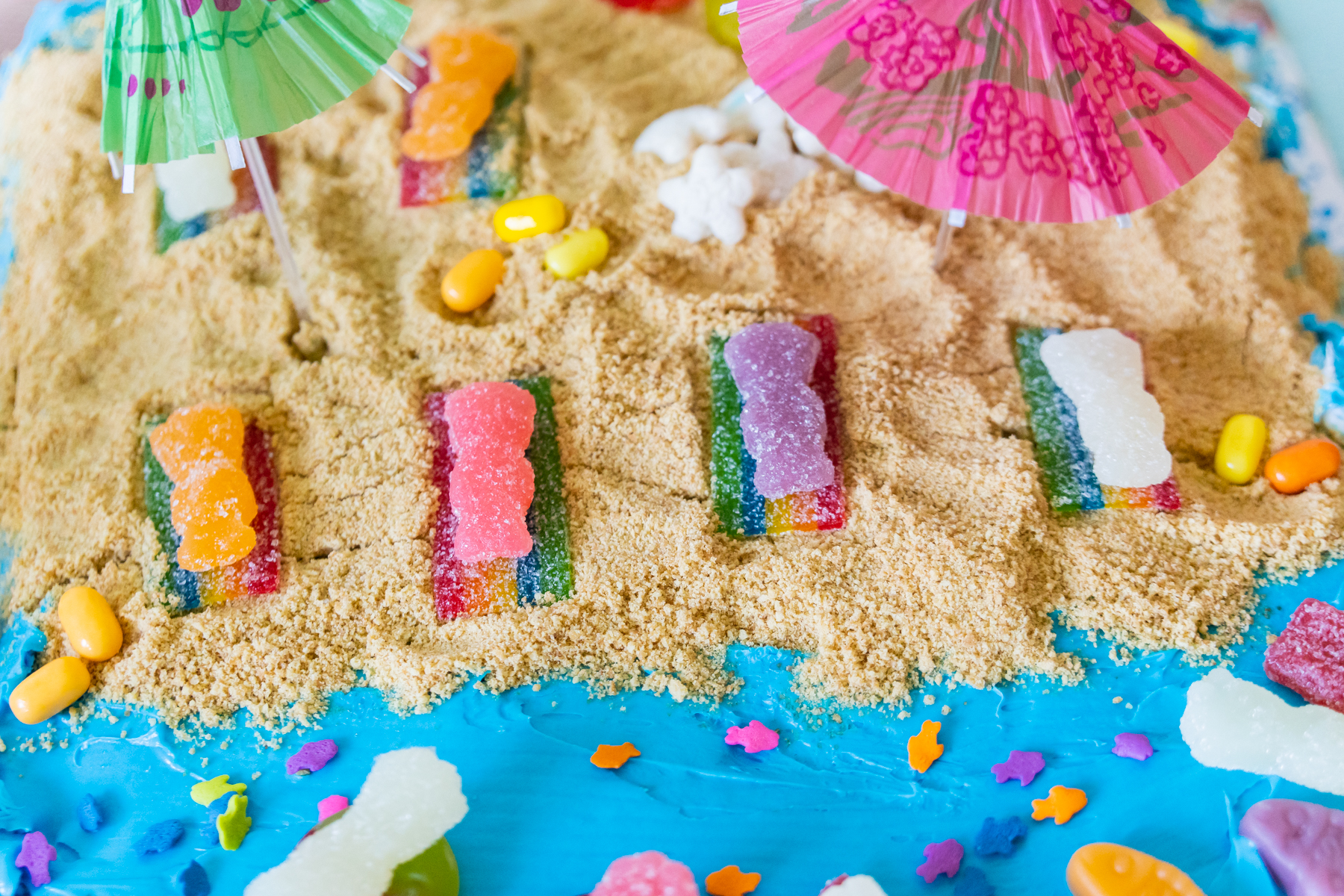 Sour Patch kids on a beach cake