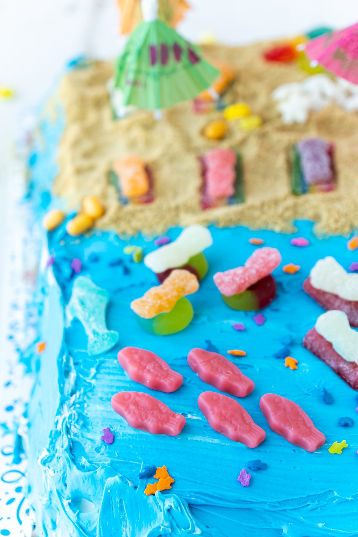 beach cake with candy fish and sharks
