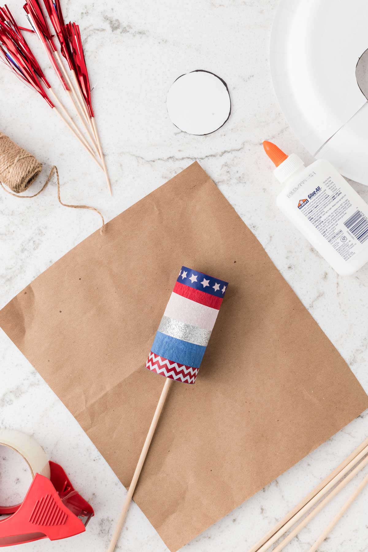 toilet paper roll on a wooden dowel