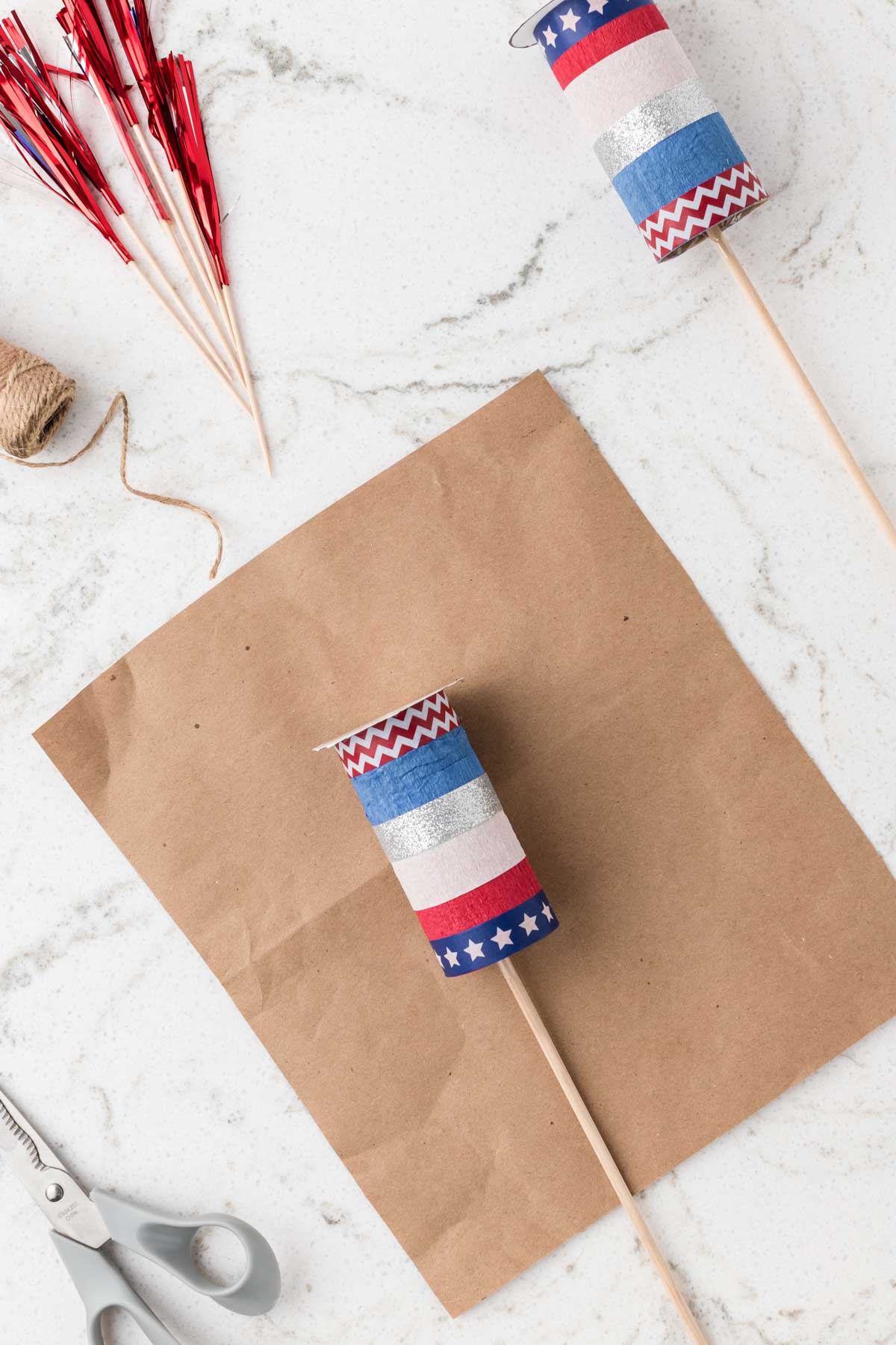 toilet paper roll with a wooden dowel through it