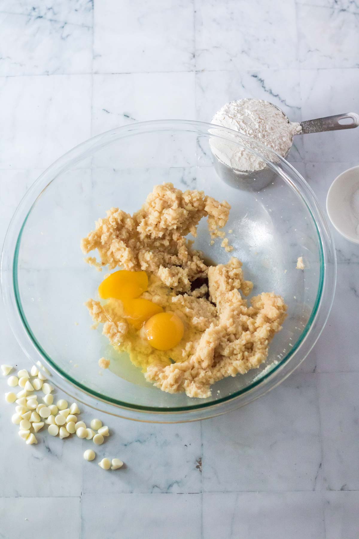 glass bowl with eggs and other wet ingredients