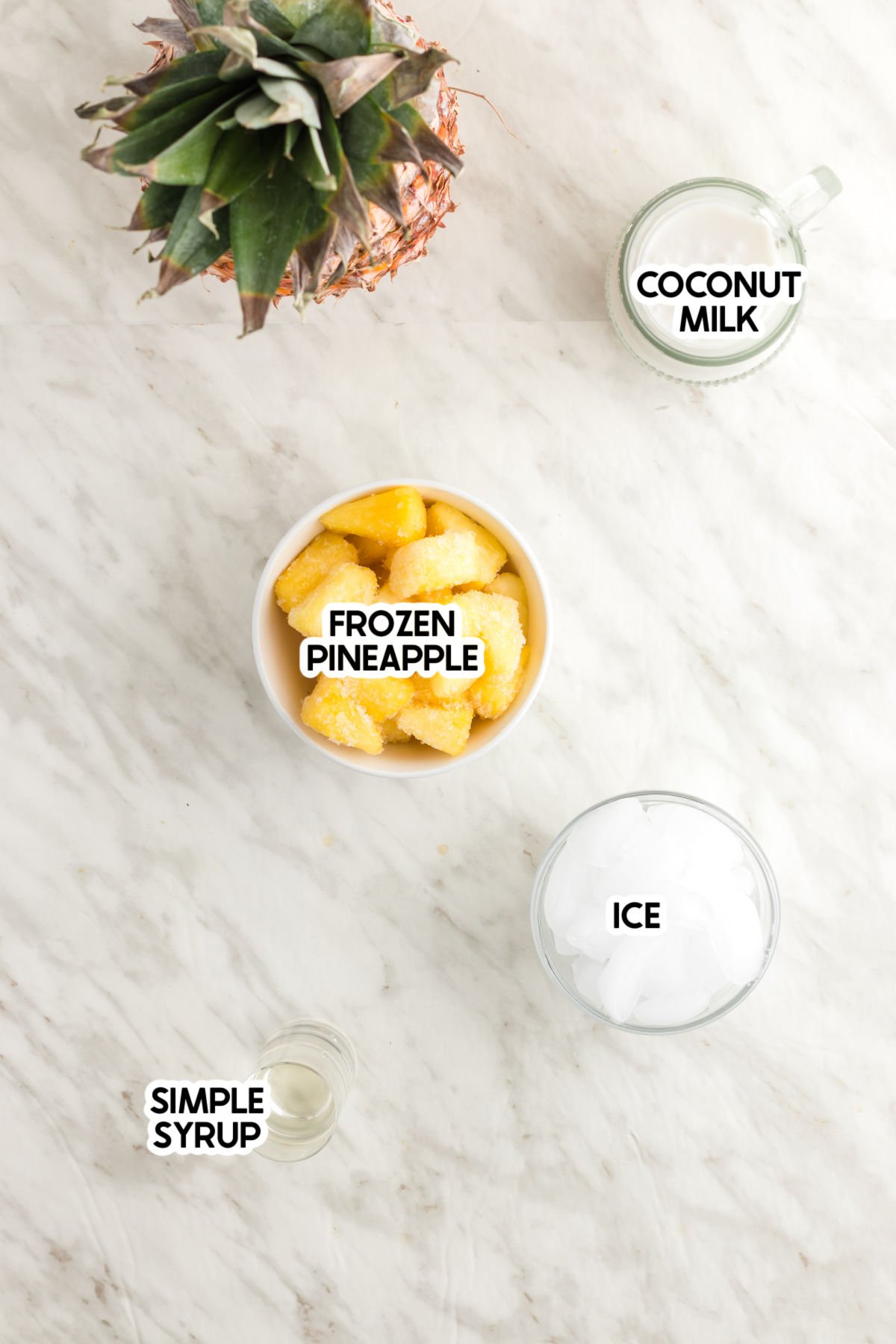 ingredients to make a virgin pina colada with labels