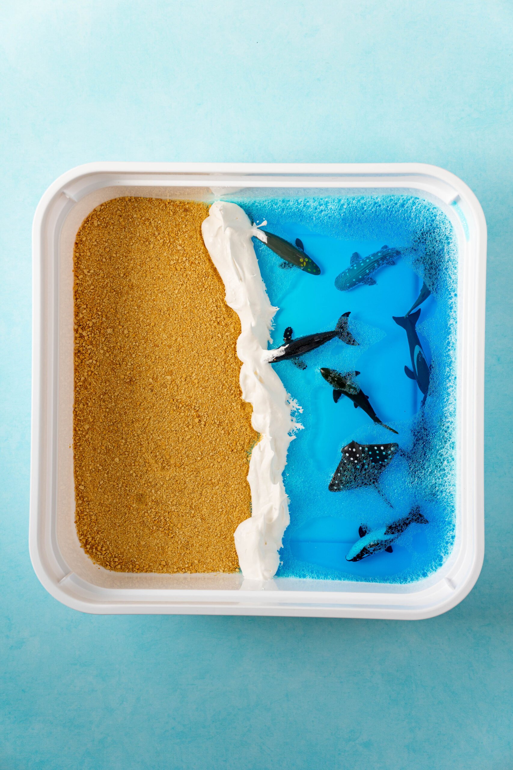 ocean sensory bin in a white bin