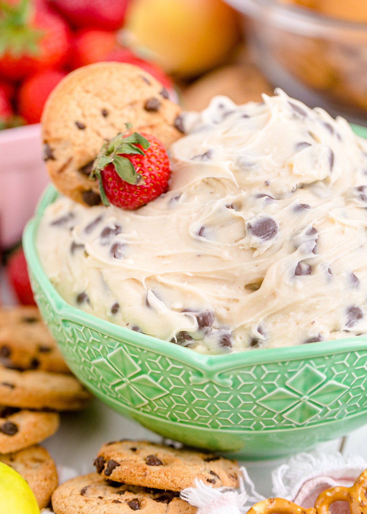 chocolate chip cookie dough dip in a green bowl