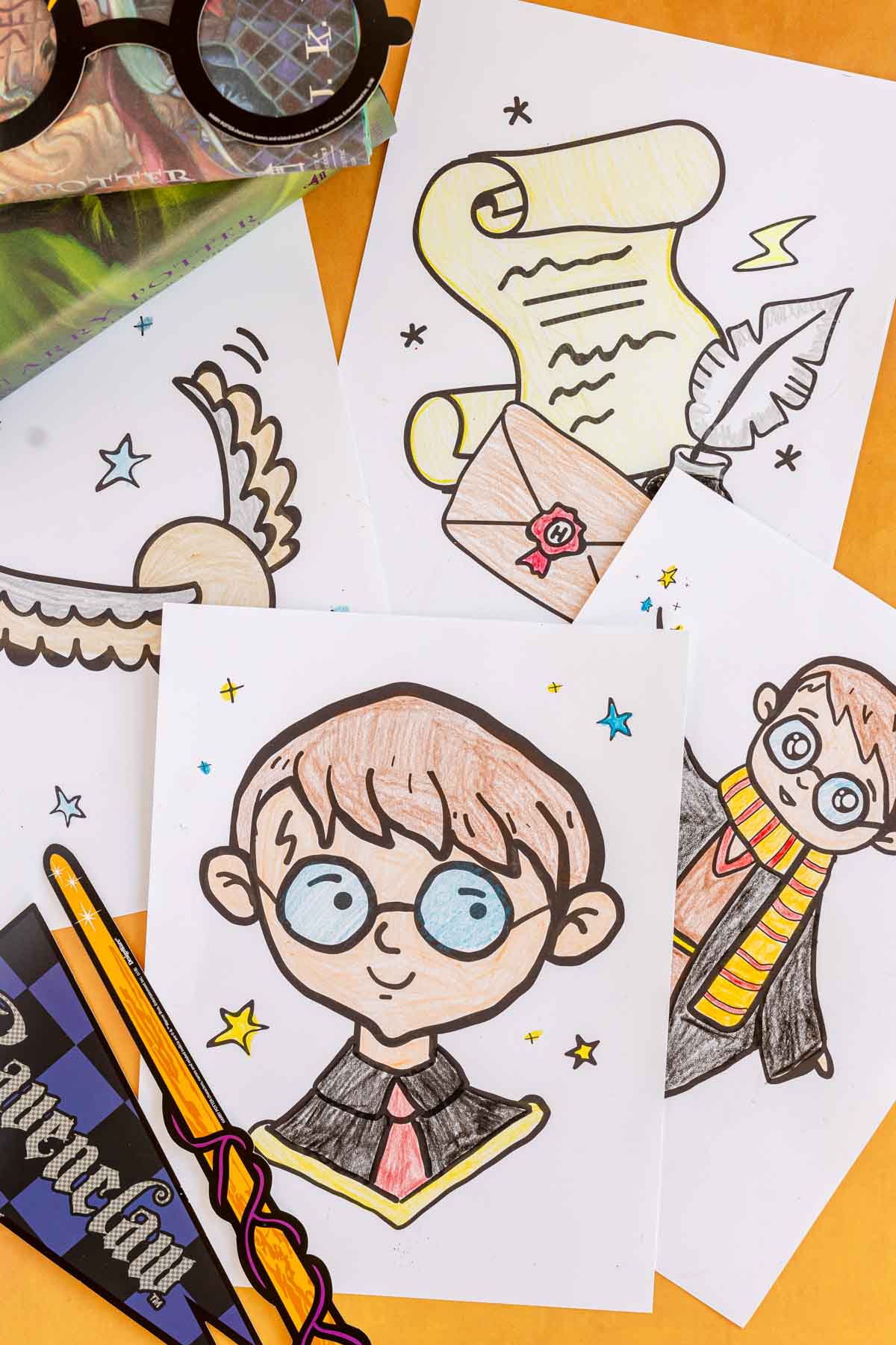 colored Harry Potter coloring pages in a stack