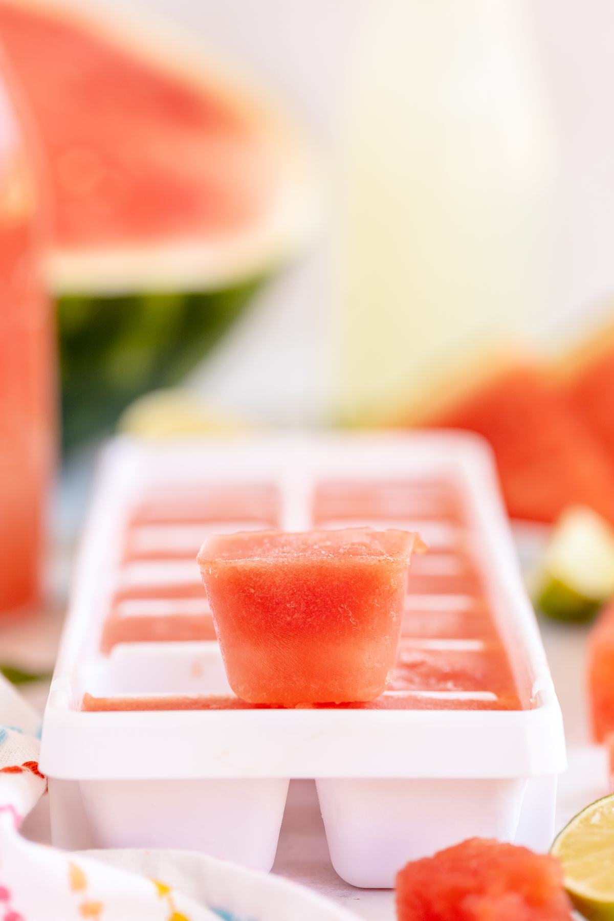 watermelon ice cube on an ice cube tray