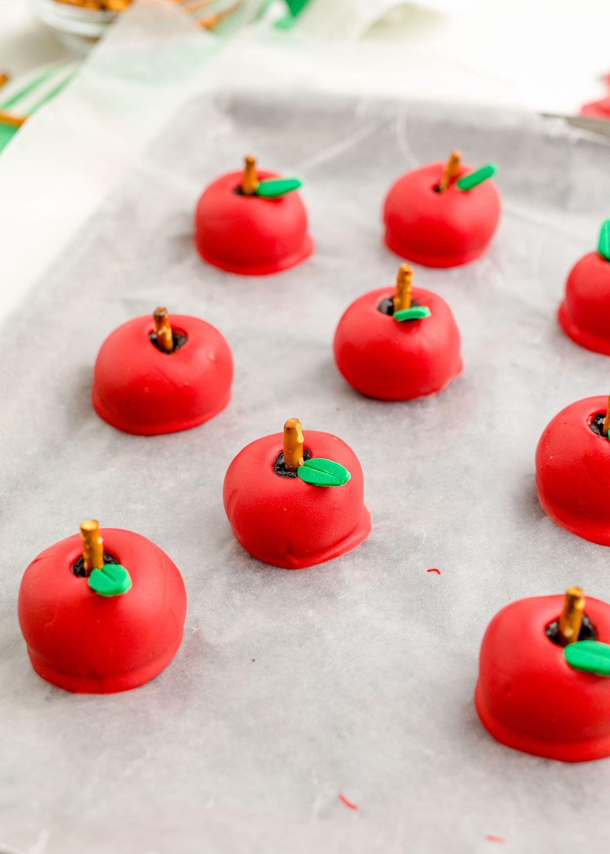 baking sheet with apple shaped oreo balls