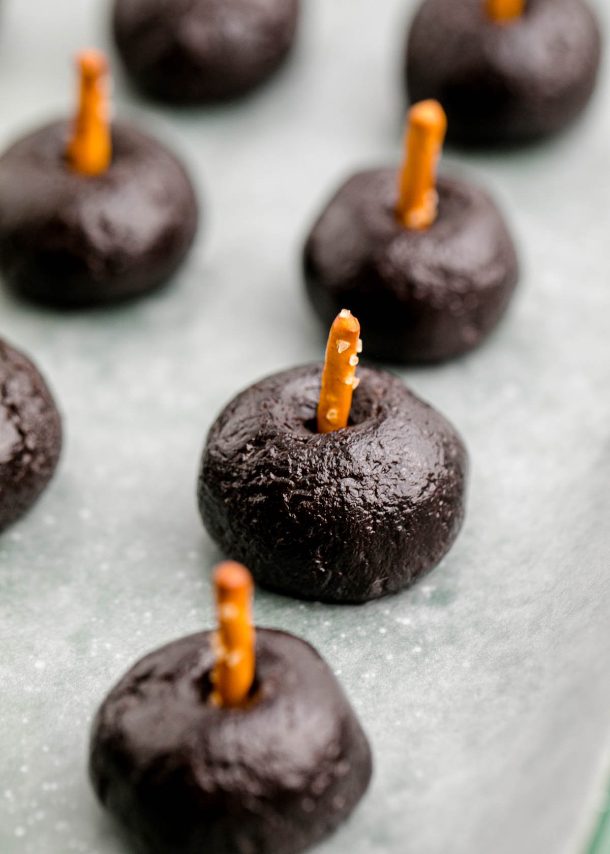 Oreo balls with pretzels in the top