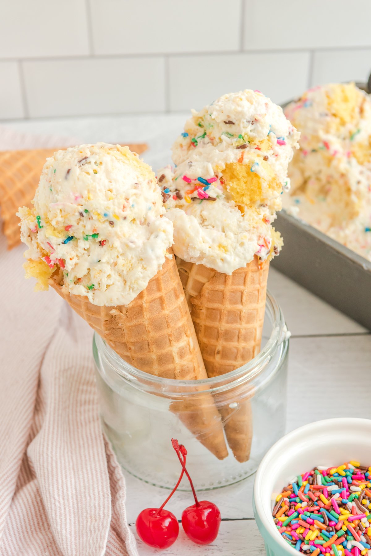 two cones of birthday cake ice cream