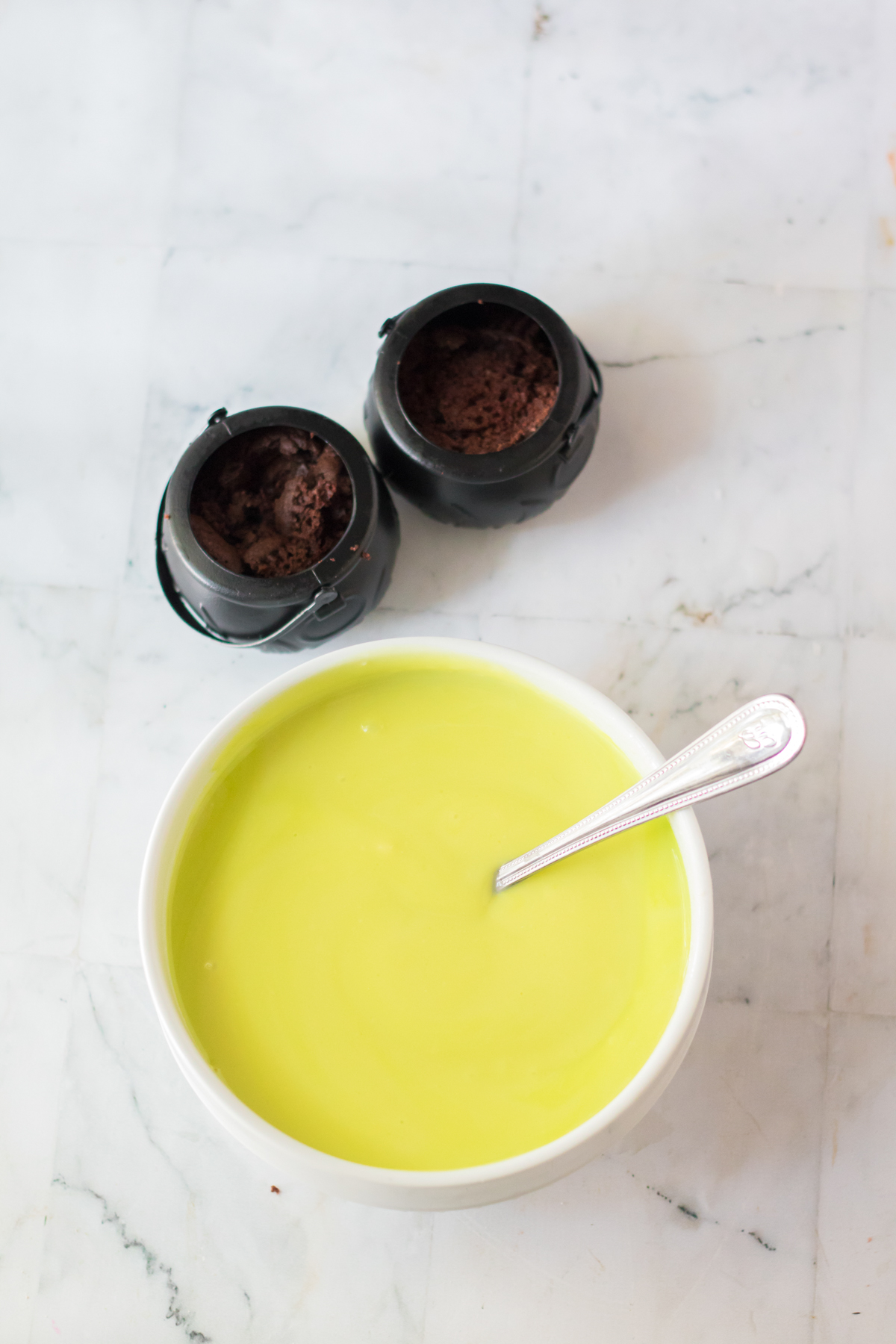 green pudding in a white bowl