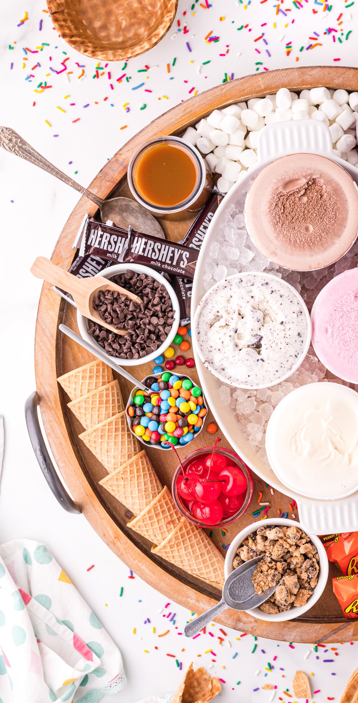 half of an ice cream sundae bar on a board