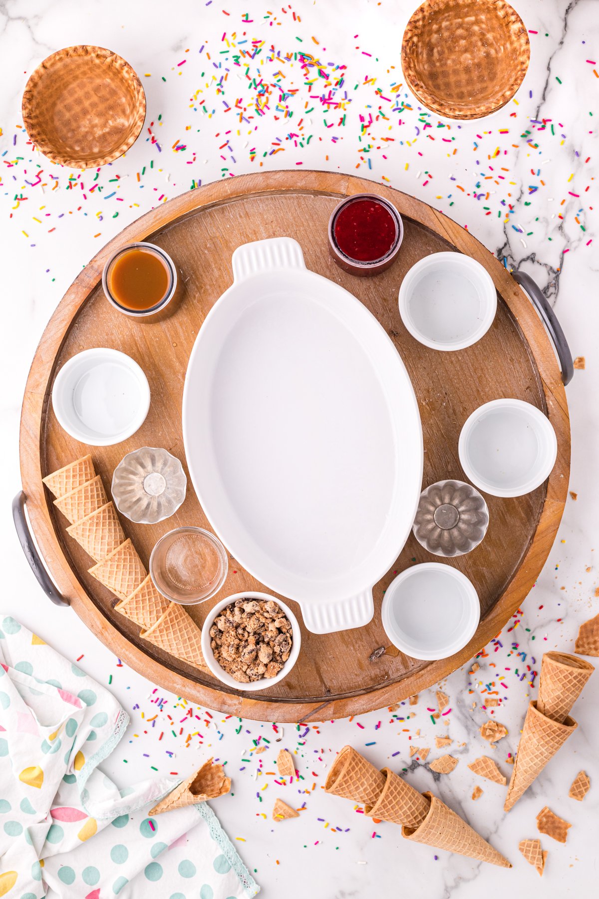 small bowls on an ice cream sundae board