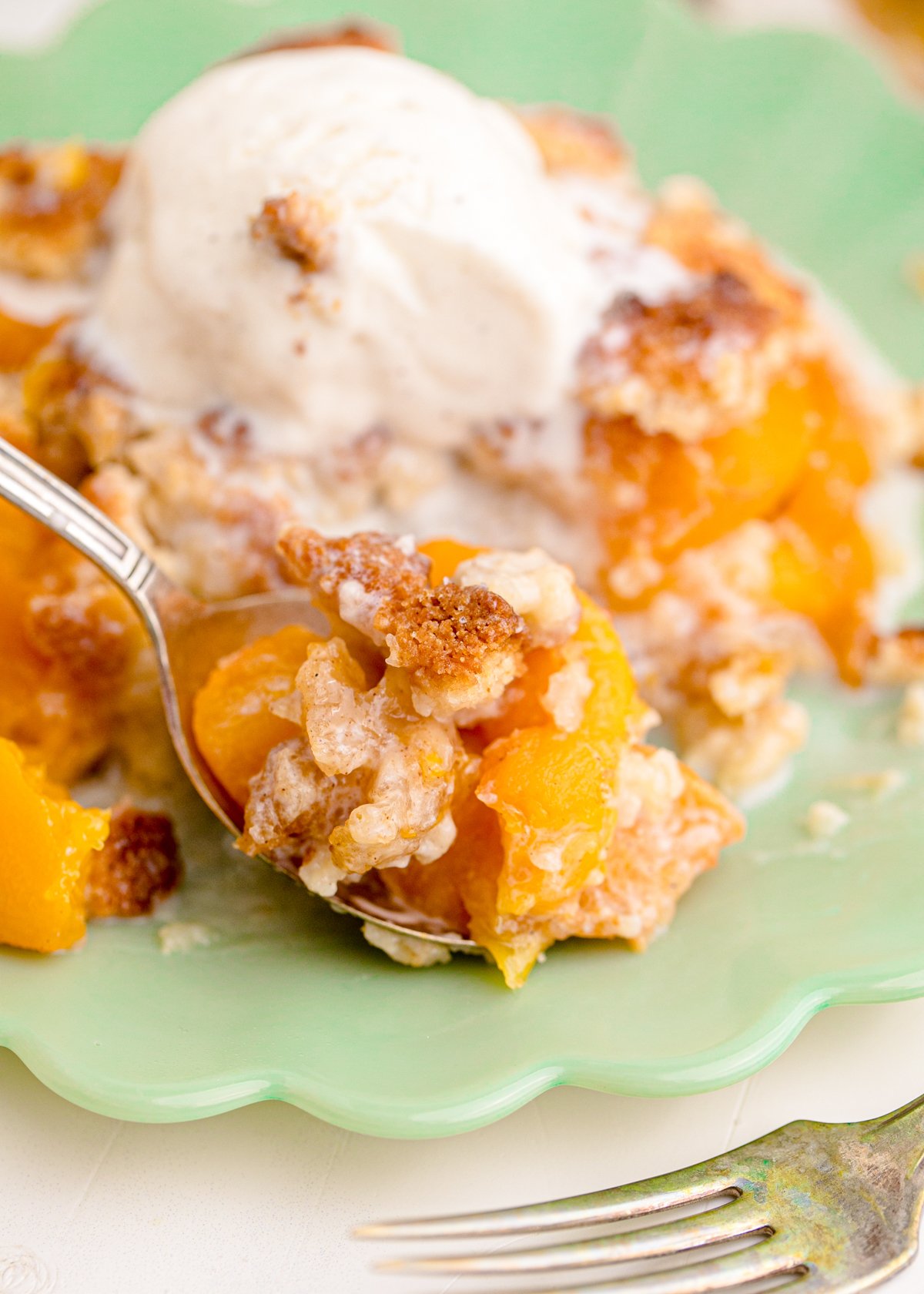 spoon full of peach cobbler