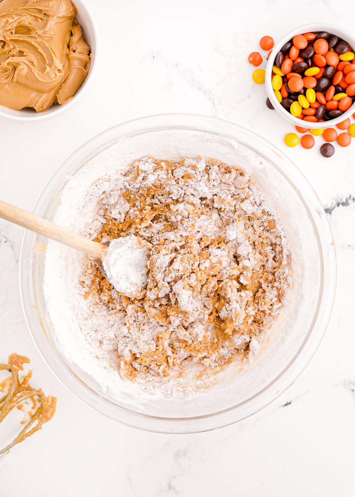 glass bowl with peanut butter cookie batter