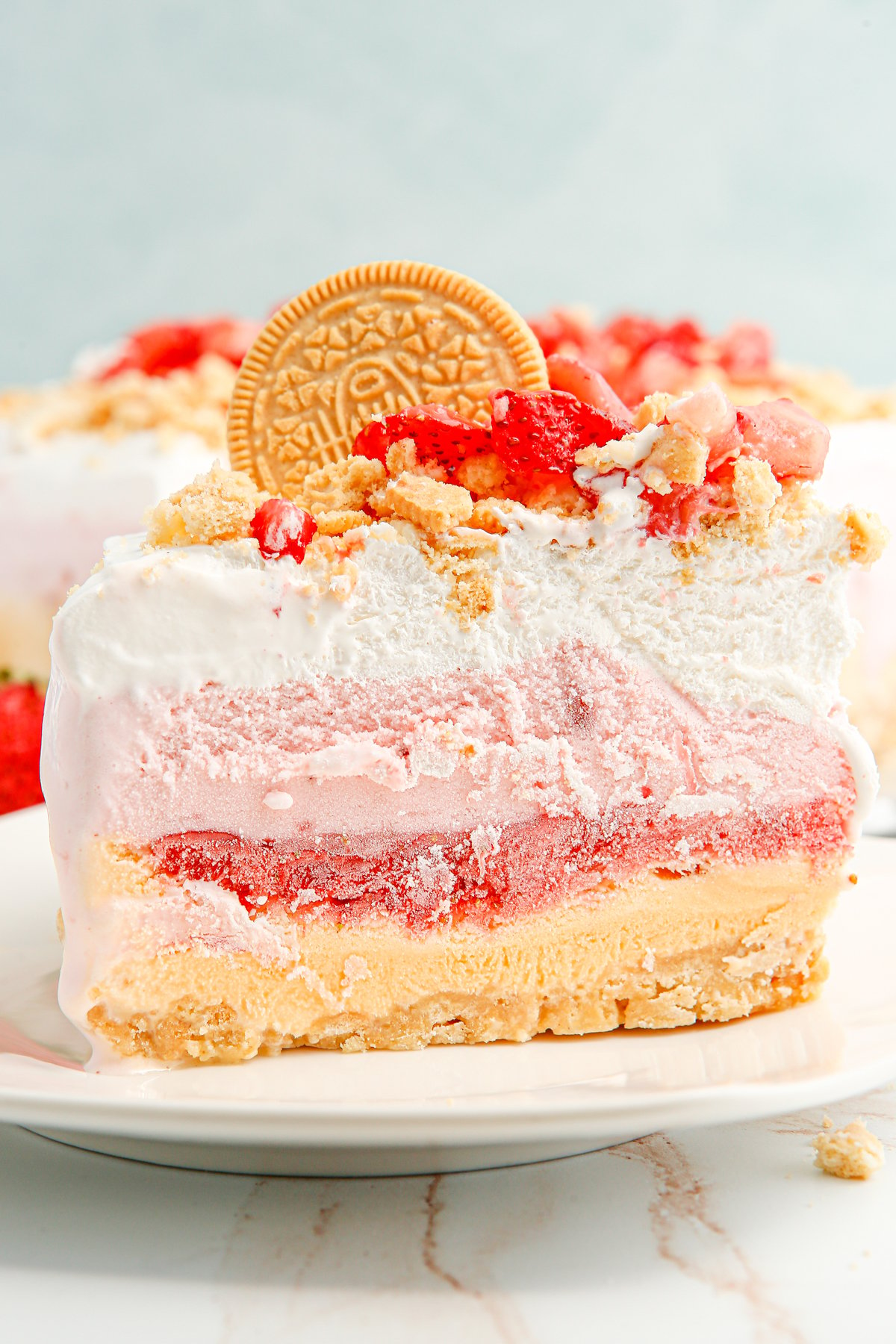 slice of strawberry ice cream cake