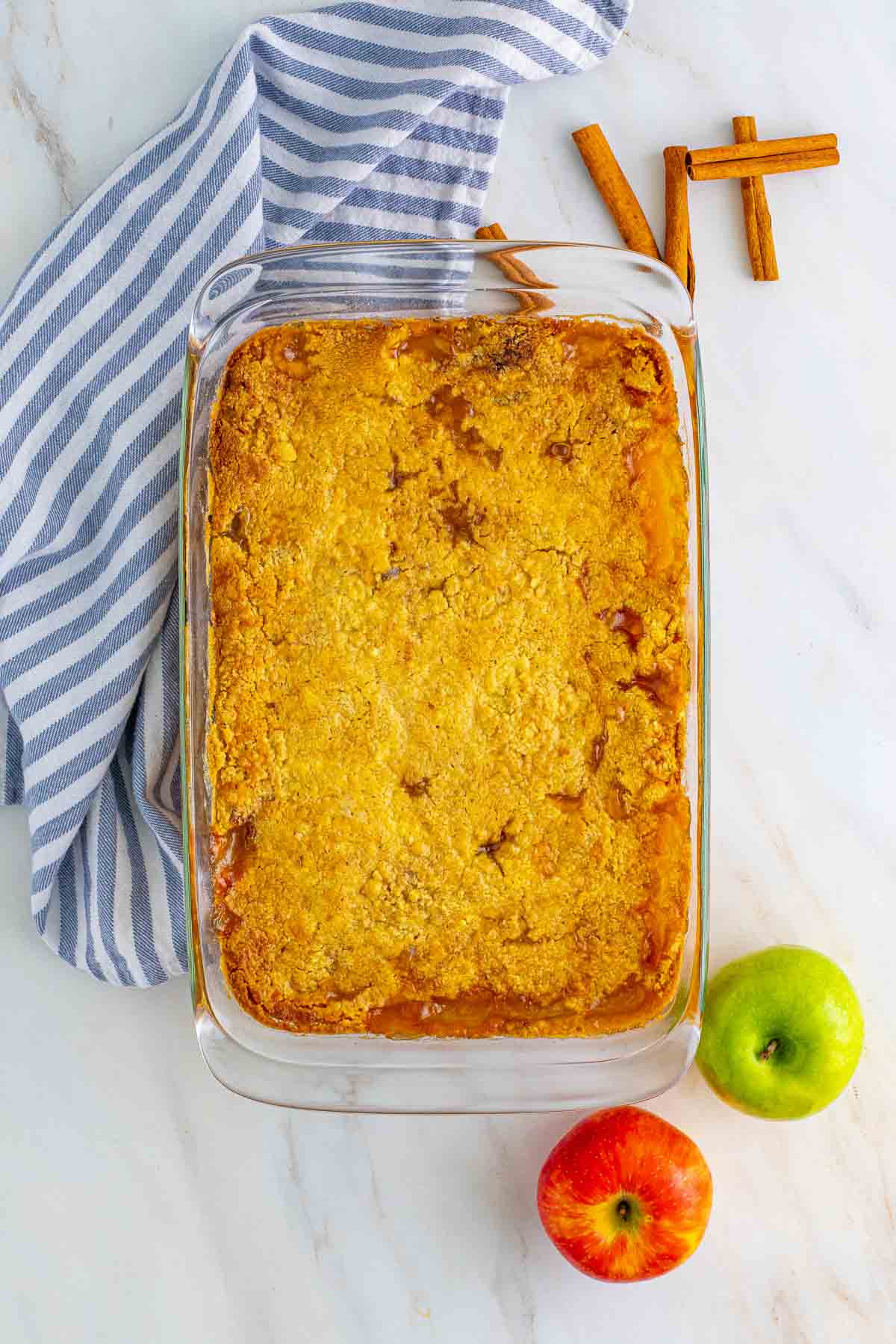 baked caramel apple dump cake in a baking dish