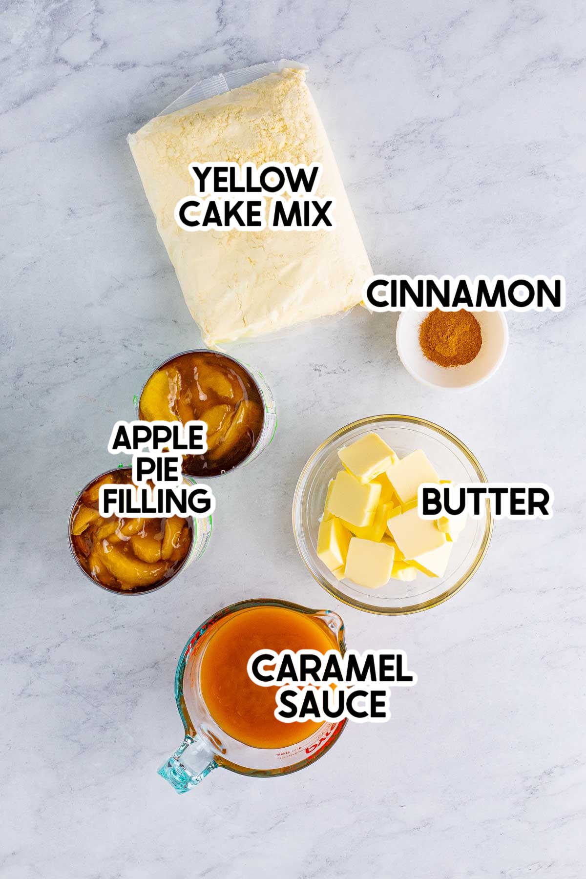 ingredients to make caramel apple dump cake with labels