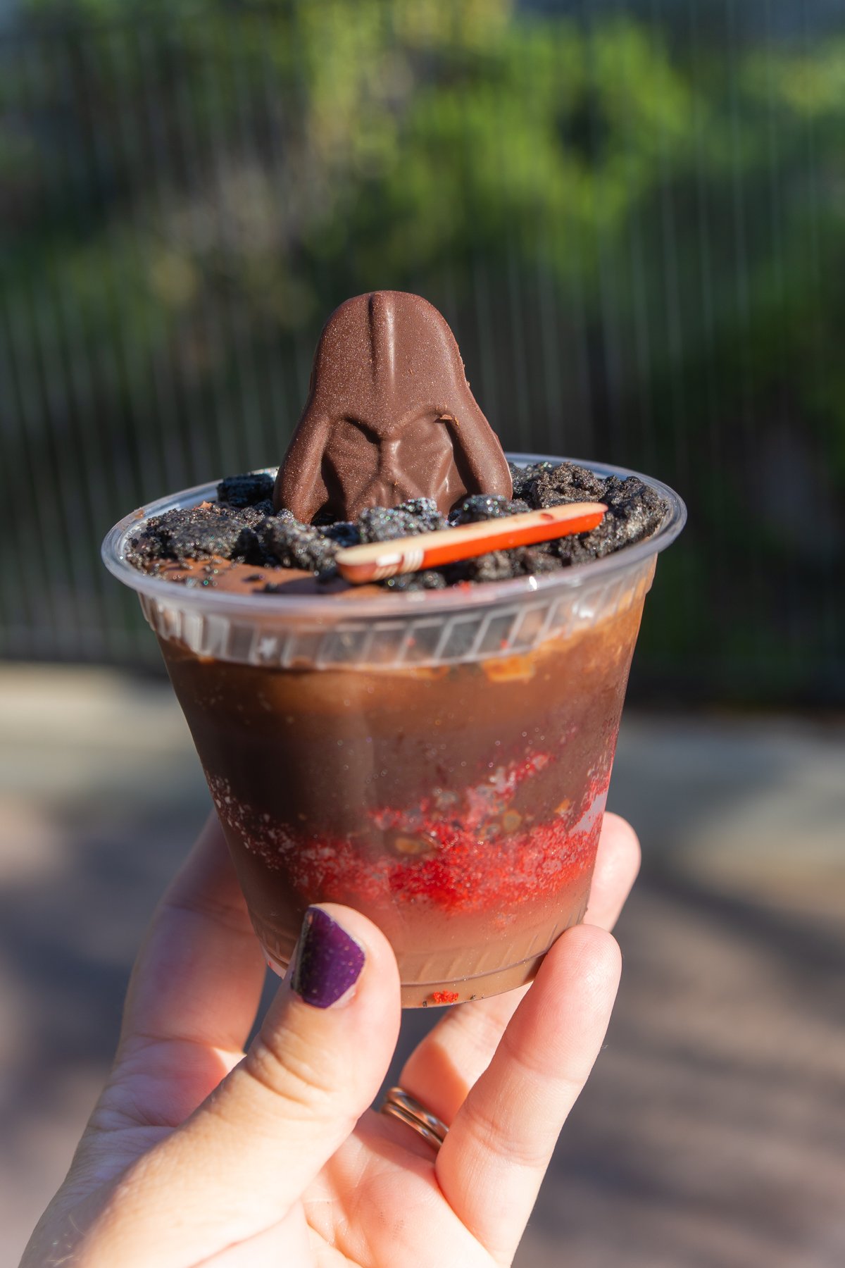 chocolate parfait held in someone's hand