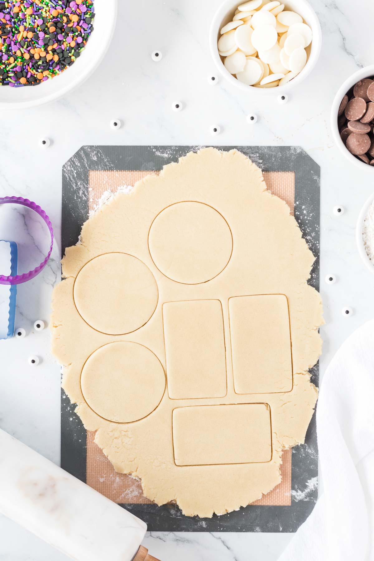 sugar cookie dough with cookie cut outs
