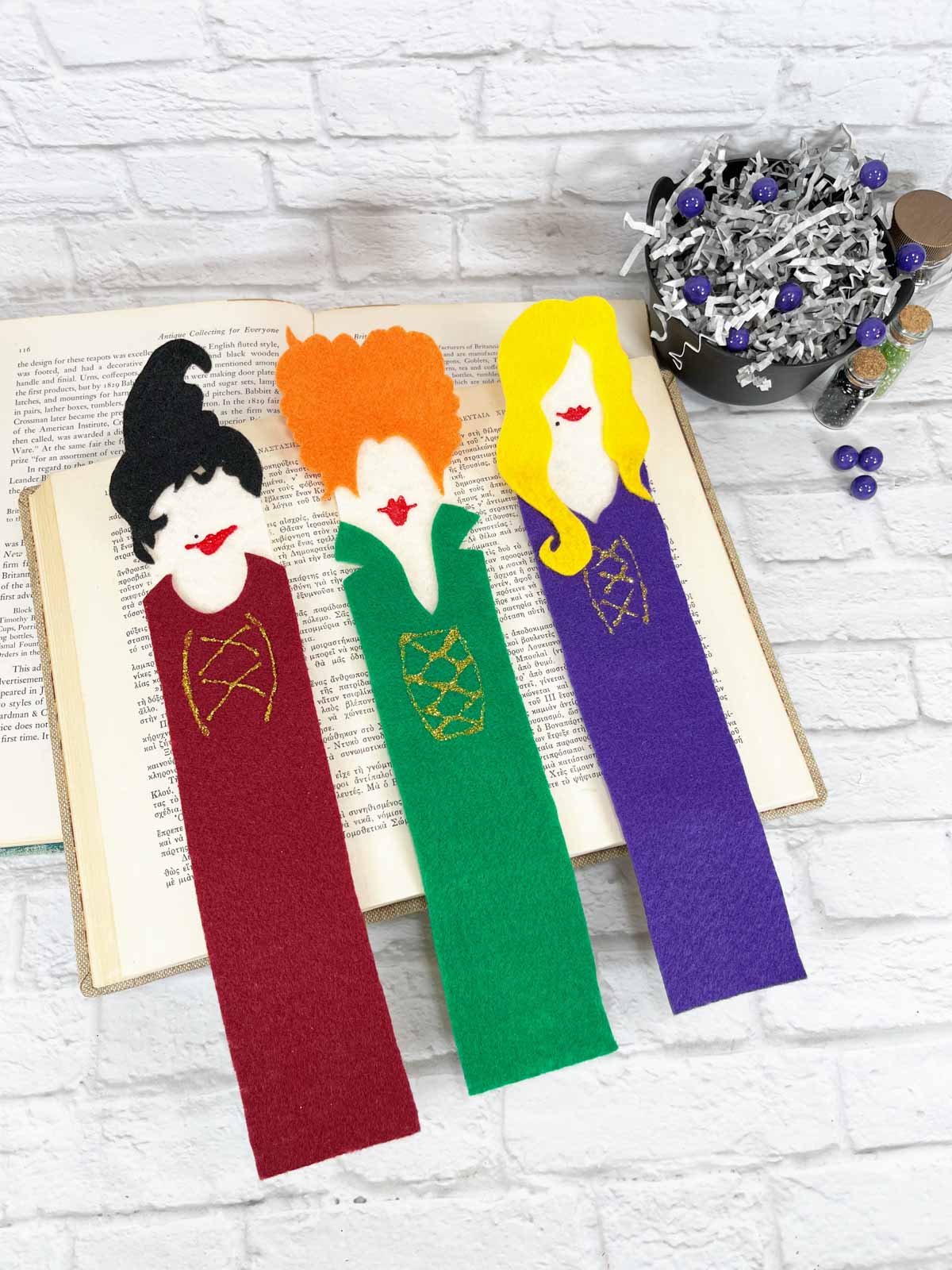 Halloween bookmarks on top of a book