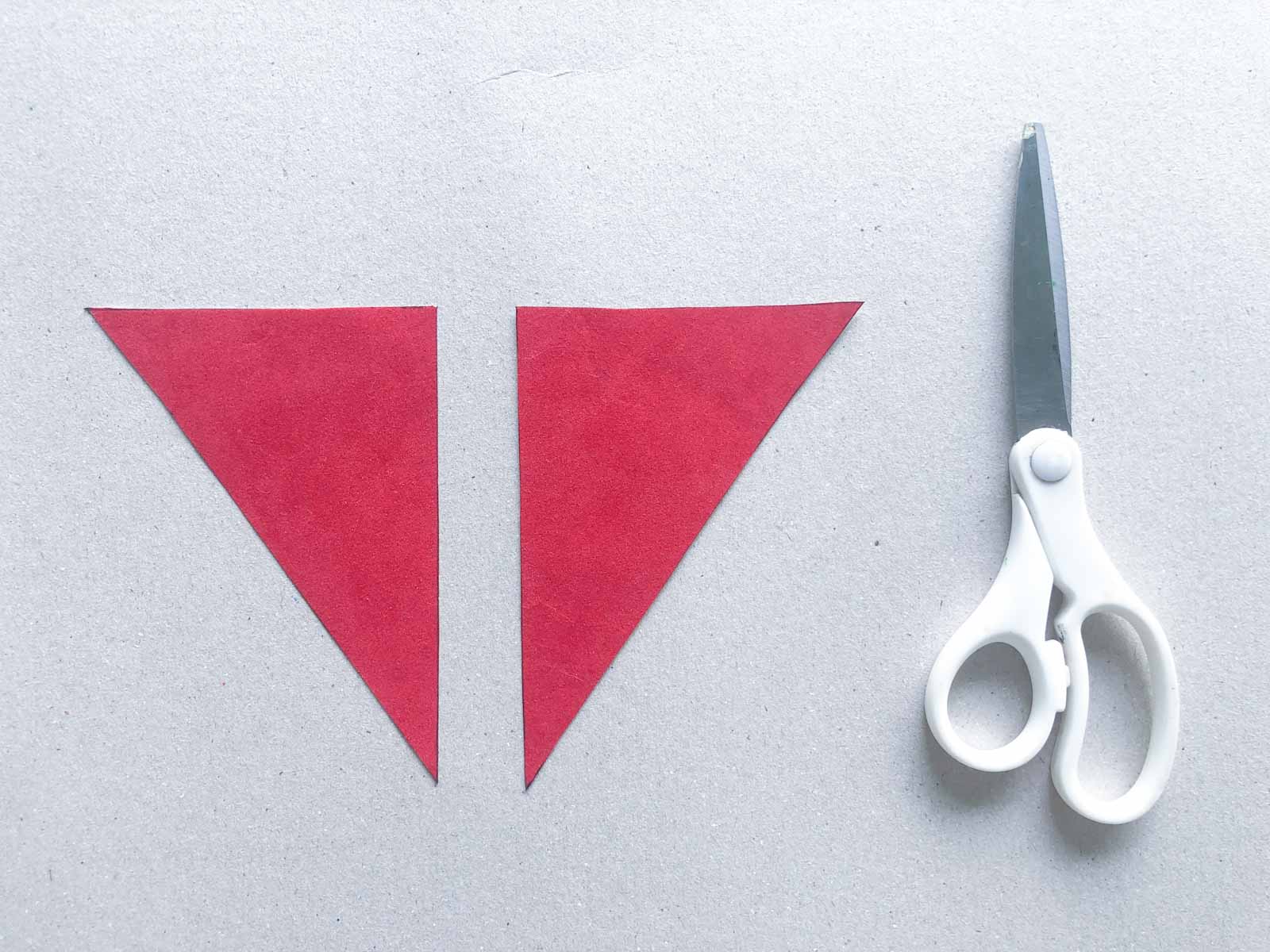 red triangles and a pair of scissors