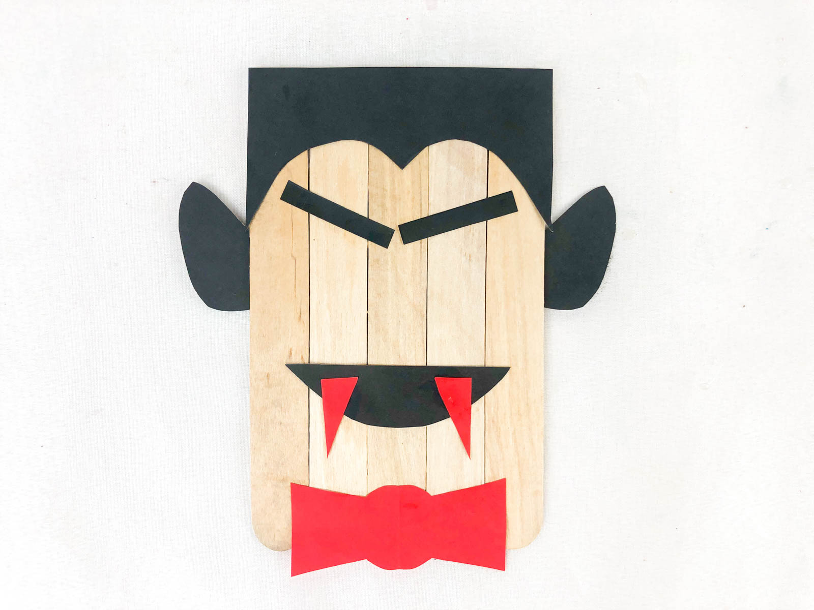 popsicle stick vampire with no eyes