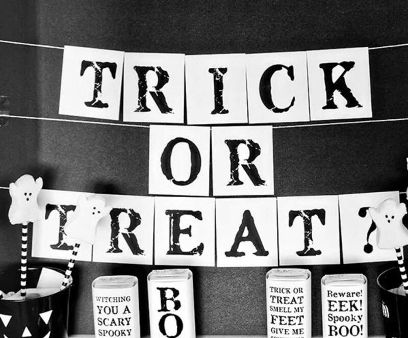 black and white trick or treat banner